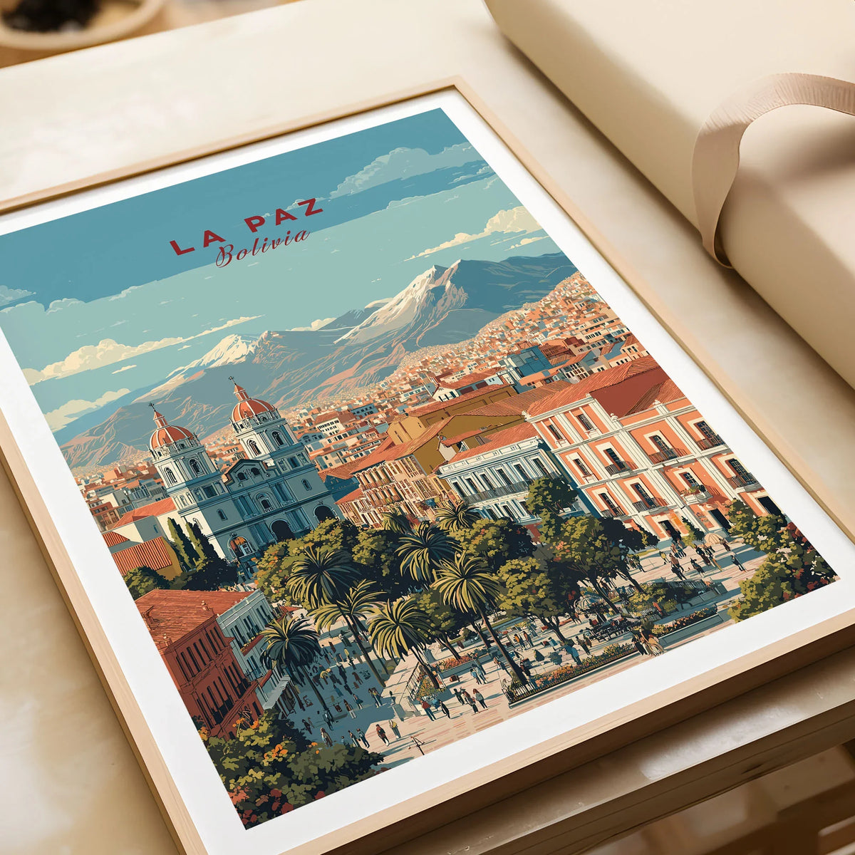 La Paz Travel Print - Bolivia Wall Art in a natural wood frame beside wrapped gift packaging, close-up detail