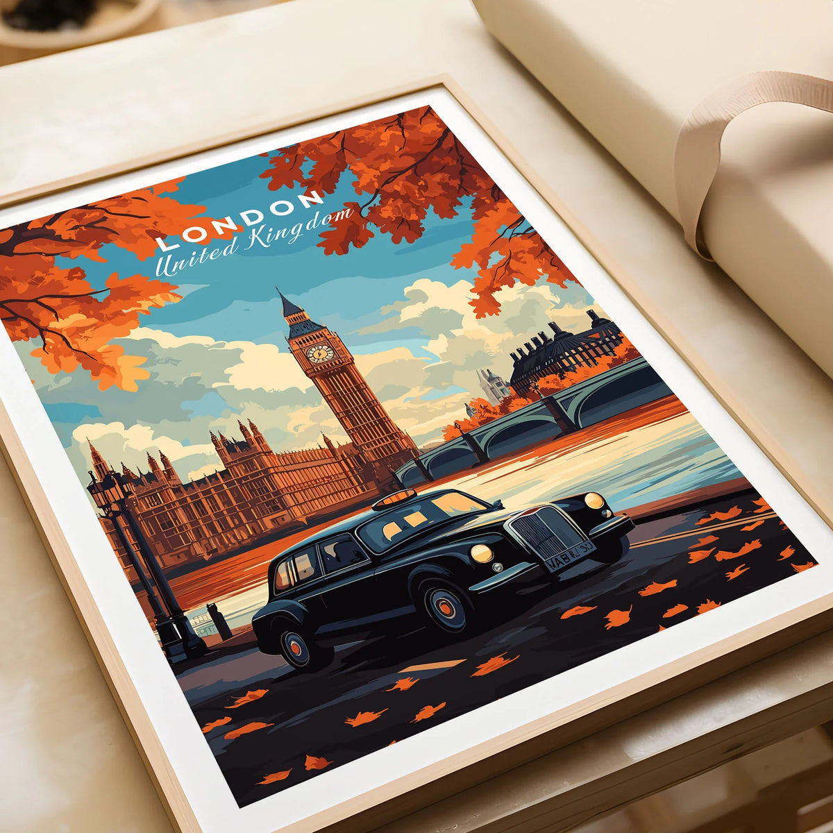 London Wall Art in a natural wood frame beside wrapped gift packaging, close-up detail