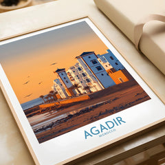 Agadir Morocco Wall Art in a natural wood frame beside wrapped gift packaging, close-up detail