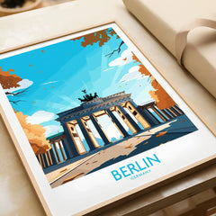 Berlin Wall Art Modern in a natural wood frame beside wrapped gift packaging, close-up detail