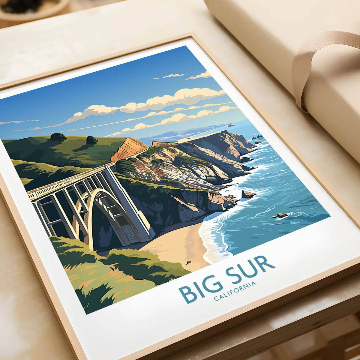 Big Sur Wall Art | Modern Style in a natural wood frame beside wrapped gift packaging, close-up detail