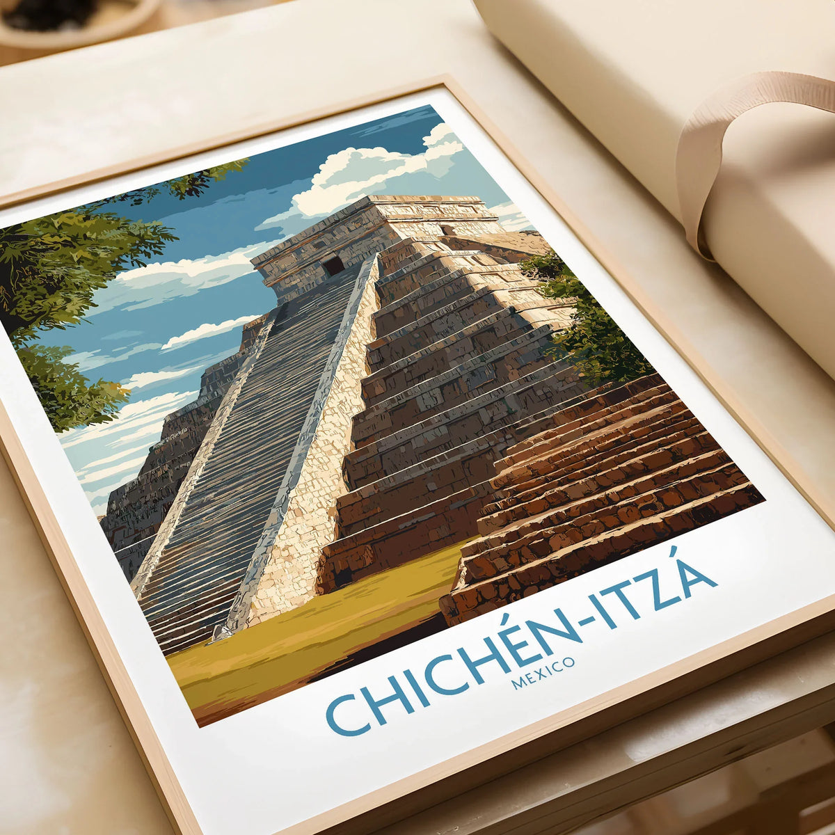 Mexico Chichén Itzá El Castillo Poster Mayan Temple Travel Print Ancient Ruins Wall Art in a natural wood frame beside wrapped gift packaging, close-up detail