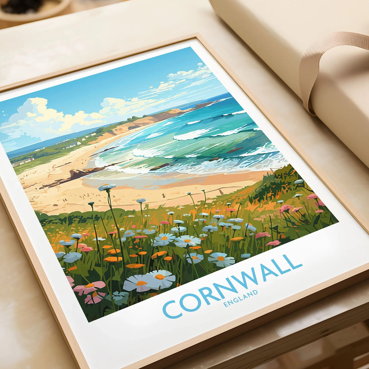 Cornwall Wall Art | Modern Style in a natural wood frame beside wrapped gift packaging, close-up detail