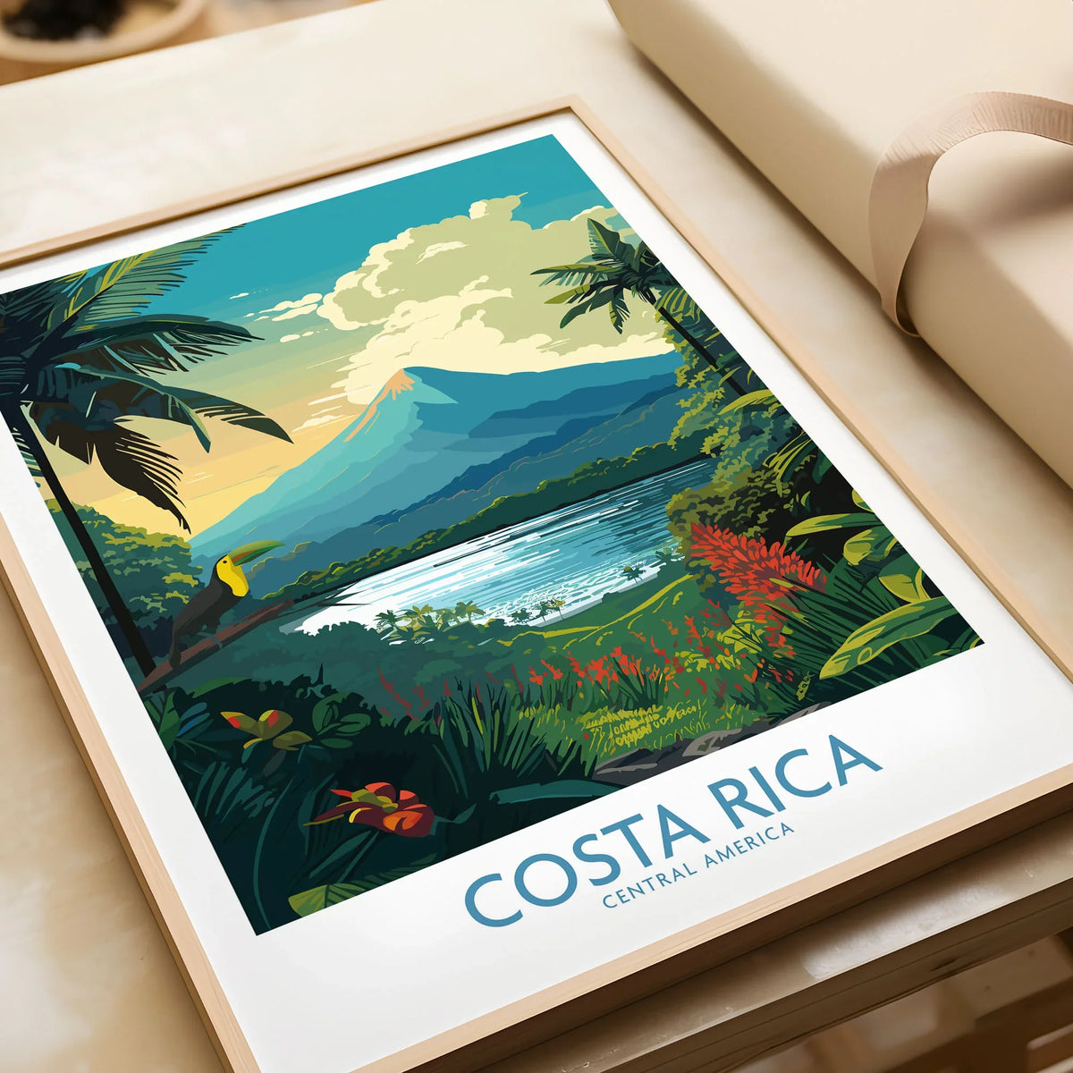 Costa Rica Wall Art | Modern Style in a natural wood frame beside wrapped gift packaging, close-up detail