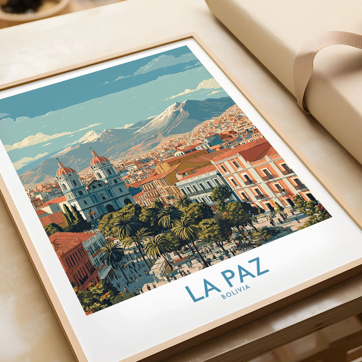 La Paz Bolivia Wall Art Poster - Bolivian Capital Travel Decor in a natural wood frame beside wrapped gift packaging, close-up detail