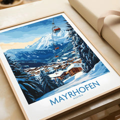 Mayrhofen Ski Poster in a natural wood frame beside wrapped gift packaging, close-up detail