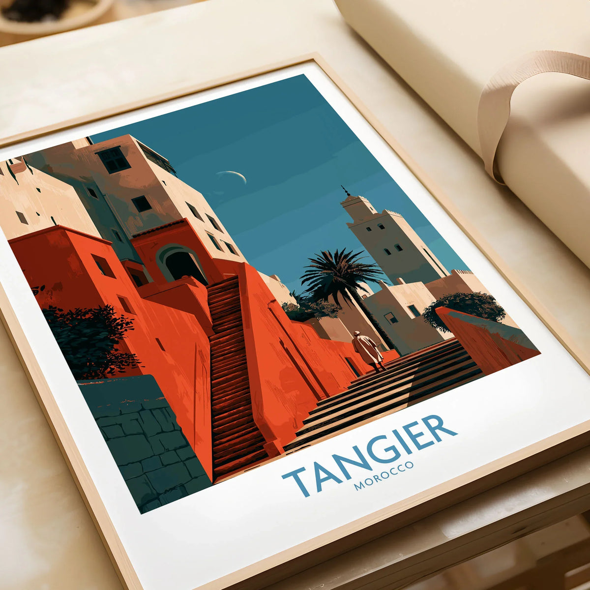 Tangier Morocco Crescent Moon Wall Art — coral kasbah steps climbing towards a minaret under a crescent moon, shown as framed art print closeup gift unwrapped natural frame