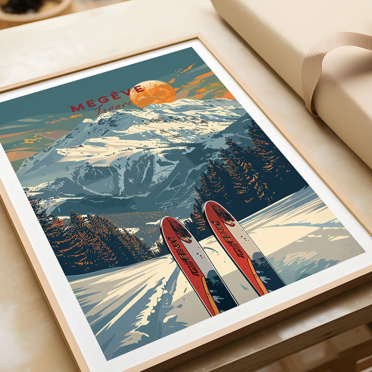 Megève Travel Poster - France in a natural wood frame beside wrapped gift packaging, close-up detail