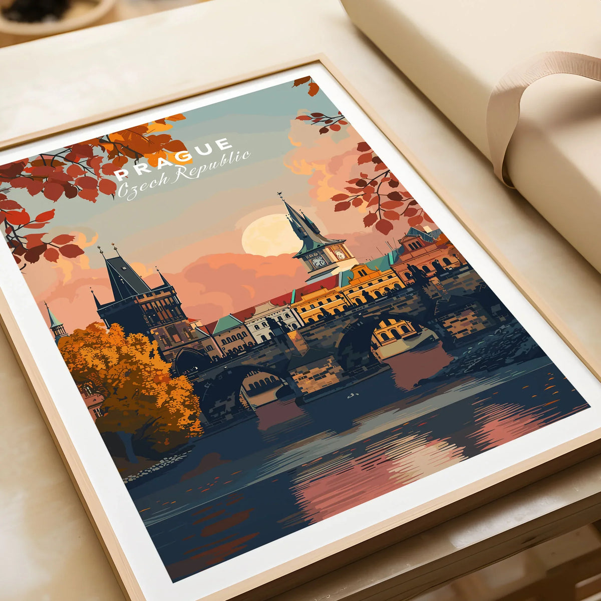 Prague Art Print in a natural wood frame beside wrapped gift packaging, close-up detail