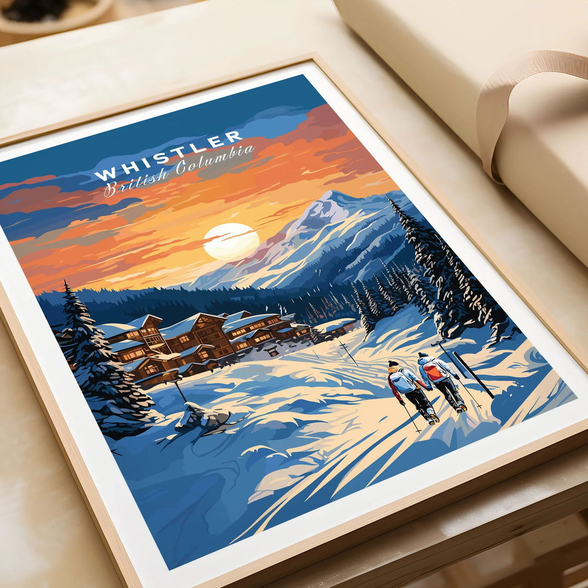 Whistler Poster in a natural wood frame beside wrapped gift packaging, close-up detail