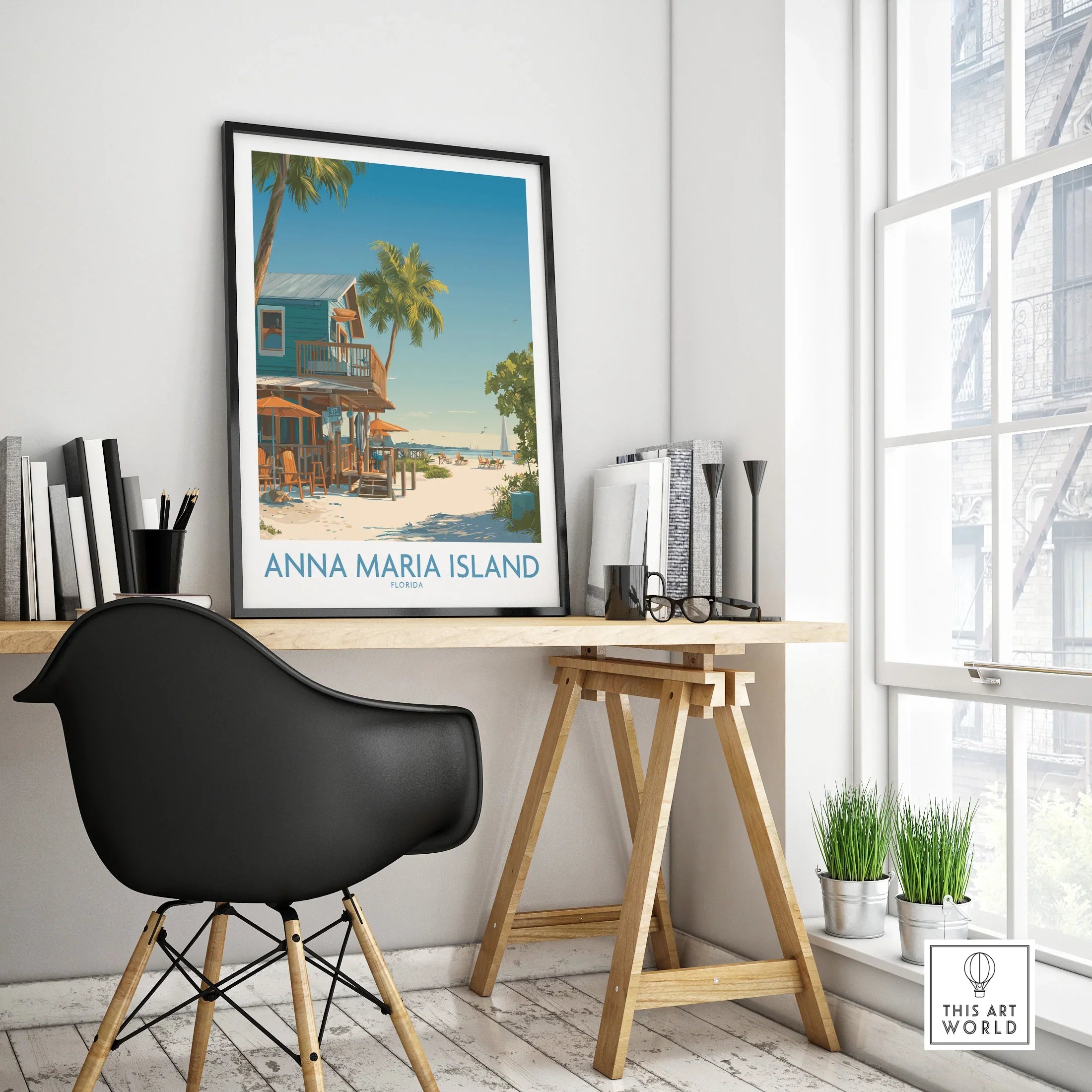 Framed Anna Maria Island travel poster on modern office desk with black chair