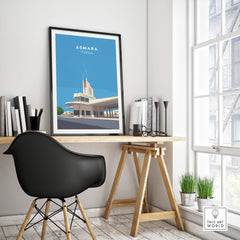 Asmara Travel Poster – Fiat Tagliero Futurist Architecture Art Print displayed in a modern workspace.