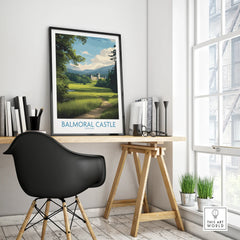 Framed Balmoral Castle travel poster on modern office desk with black chair and decor