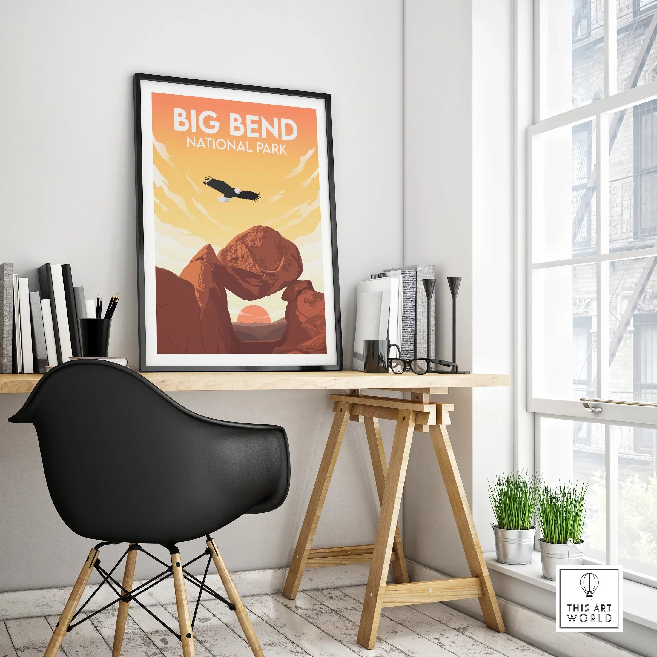 Framed Big Bend National Park travel poster on modern office desk, sunrise landscape art