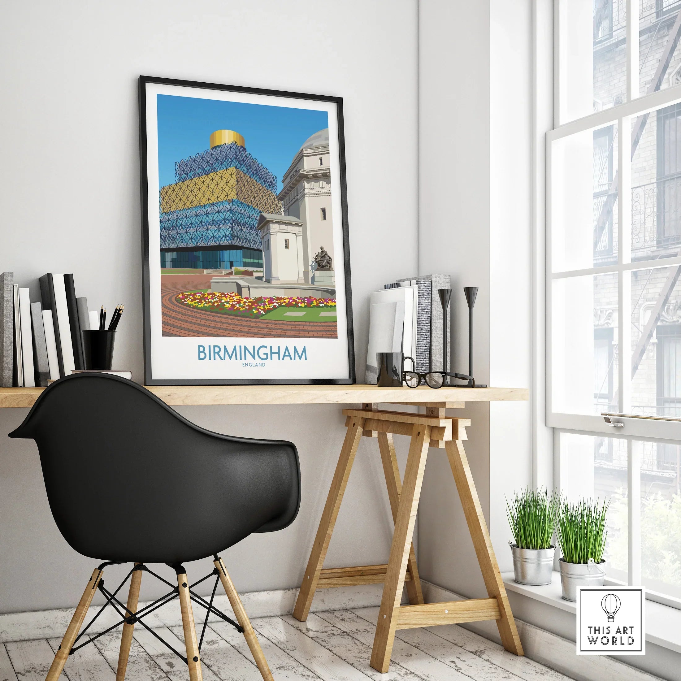 Framed Birmingham city skyline travel poster on modern office desk with chair and decor