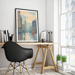 Framed Birmingham city skyline travel poster on a modern office desk, home decor setting.