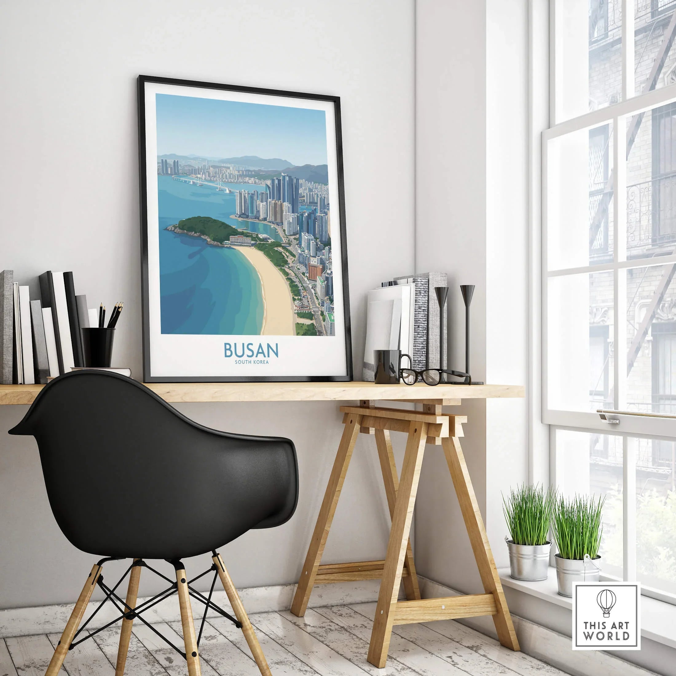 Busan city skyline travel poster with black frame on a modern office desk, minimalist decor