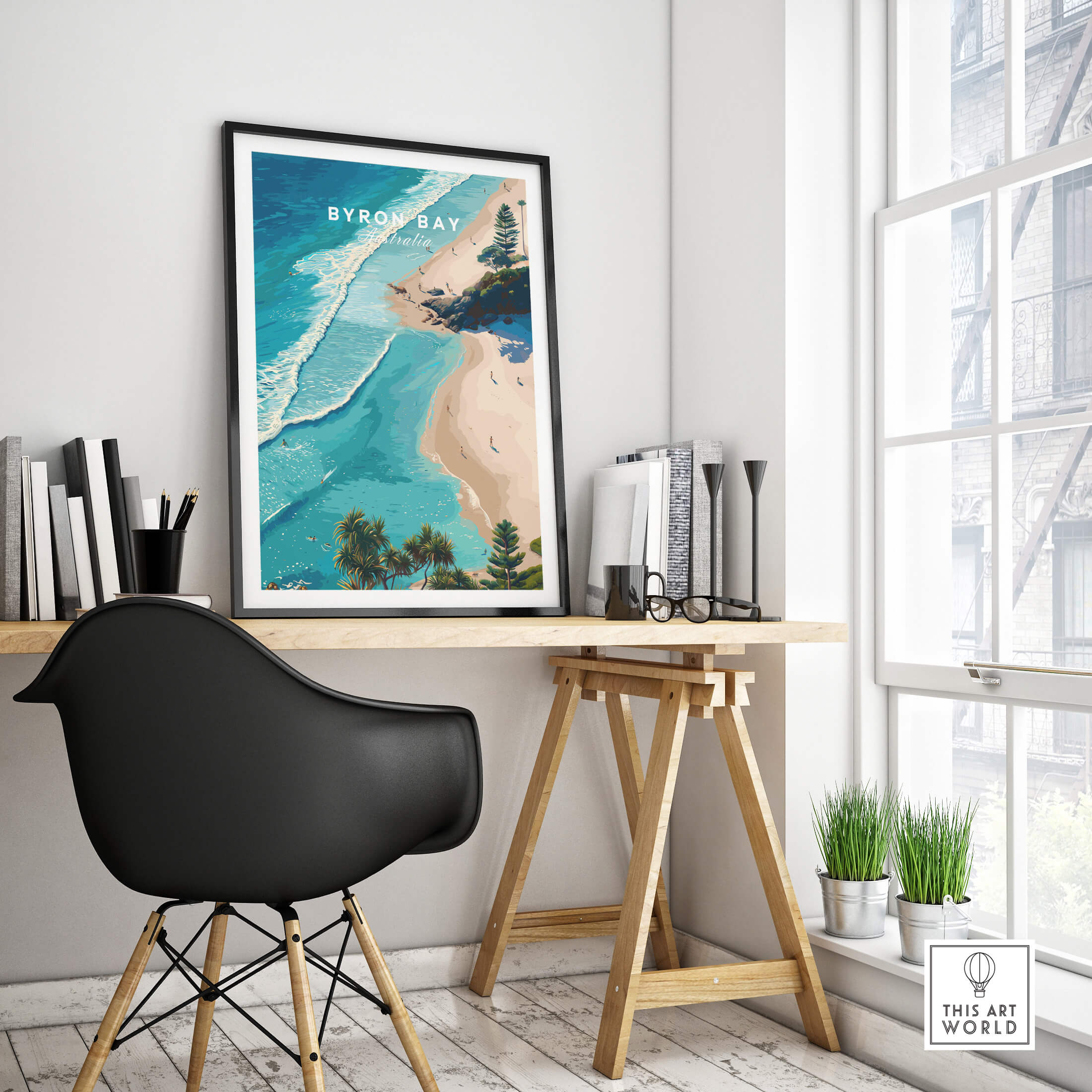 Byron Bay Art Print displayed in a modern workspace, showcasing stunning aerial views of coastal beauty.