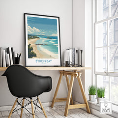 Byron Bay Wall Art Australia Travel Print displayed in a stylish workspace, featuring coastal scenery and a contemporary design.