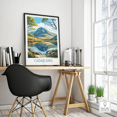 Framed Cadair Idris travel poster on modern office desk in bright minimalist room