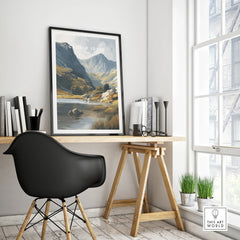 Framed Cadair Idris travel poster on modern office desk with black chair and decor