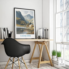 Framed Cadair Idris travel poster on modern office desk in bright home workspace