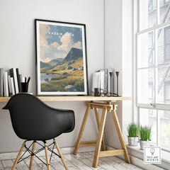 Framed Cadair Idris travel poster on modern home office desk by large window