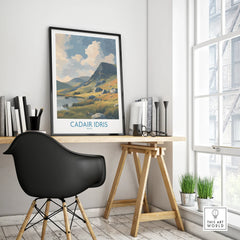 Framed Cadair Idris travel poster on modern office desk, mountain wall art decor