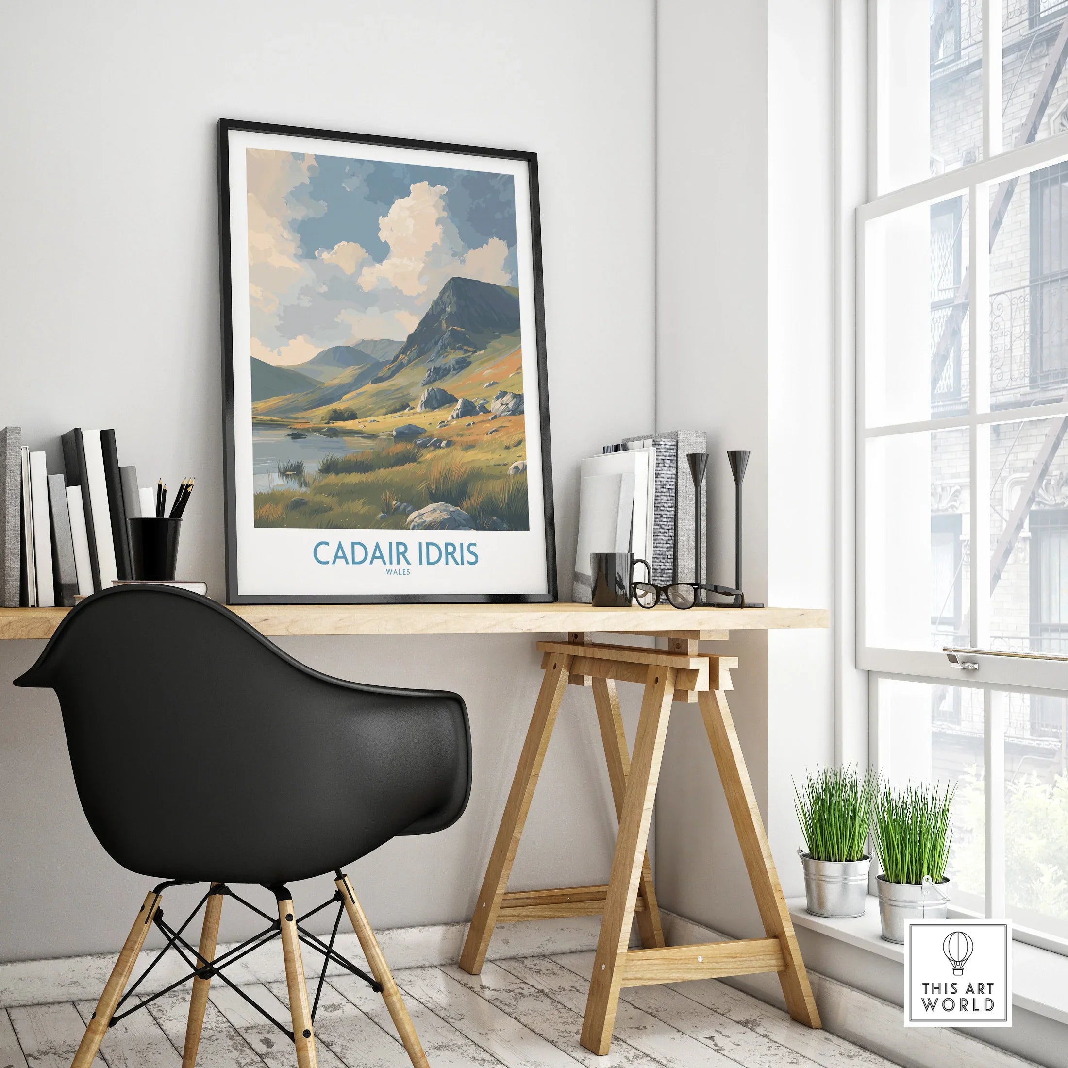 Framed Cadair Idris travel poster on modern office desk, mountain wall art decor