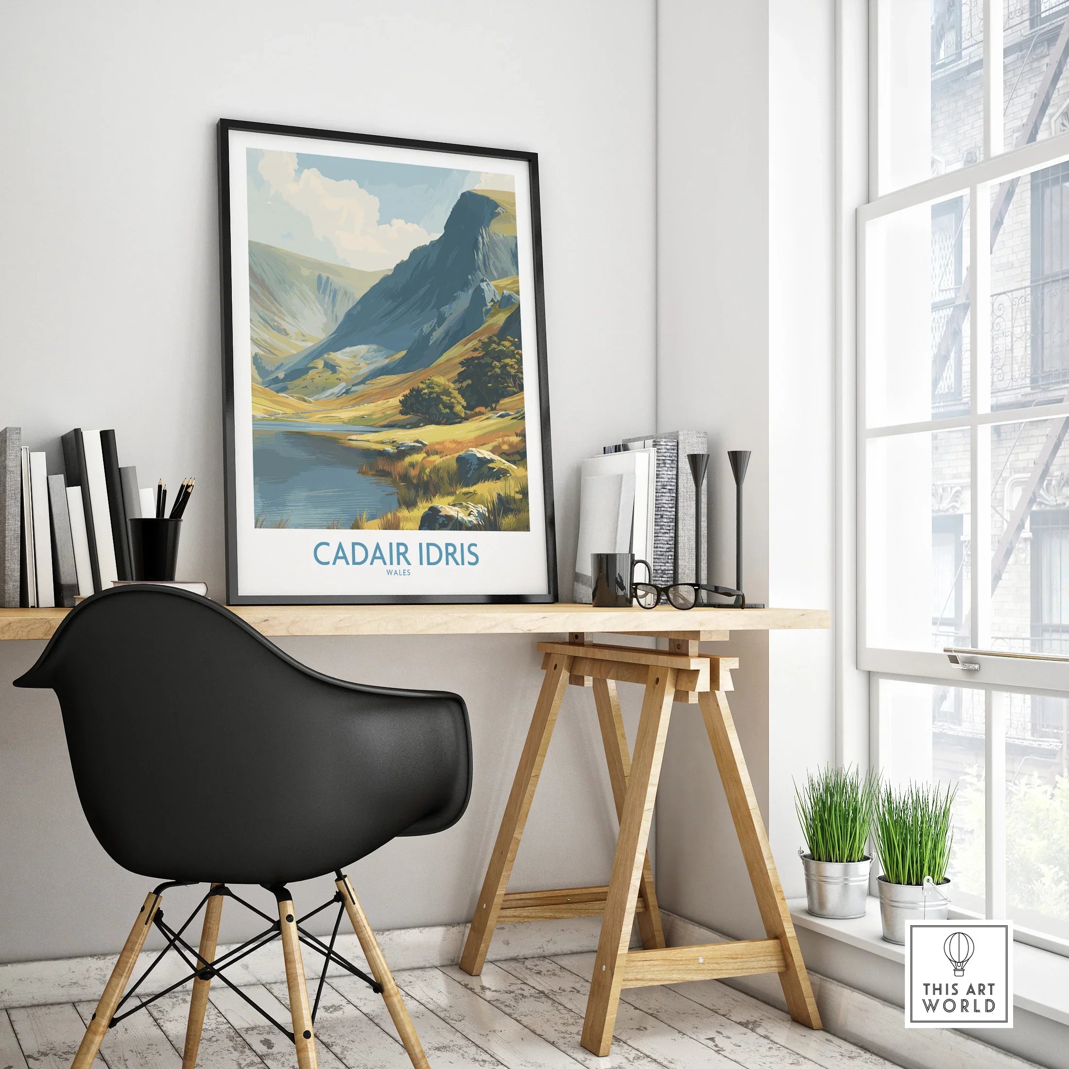 Framed Cadair Idris travel poster on modern office desk, black chair, minimalist decor