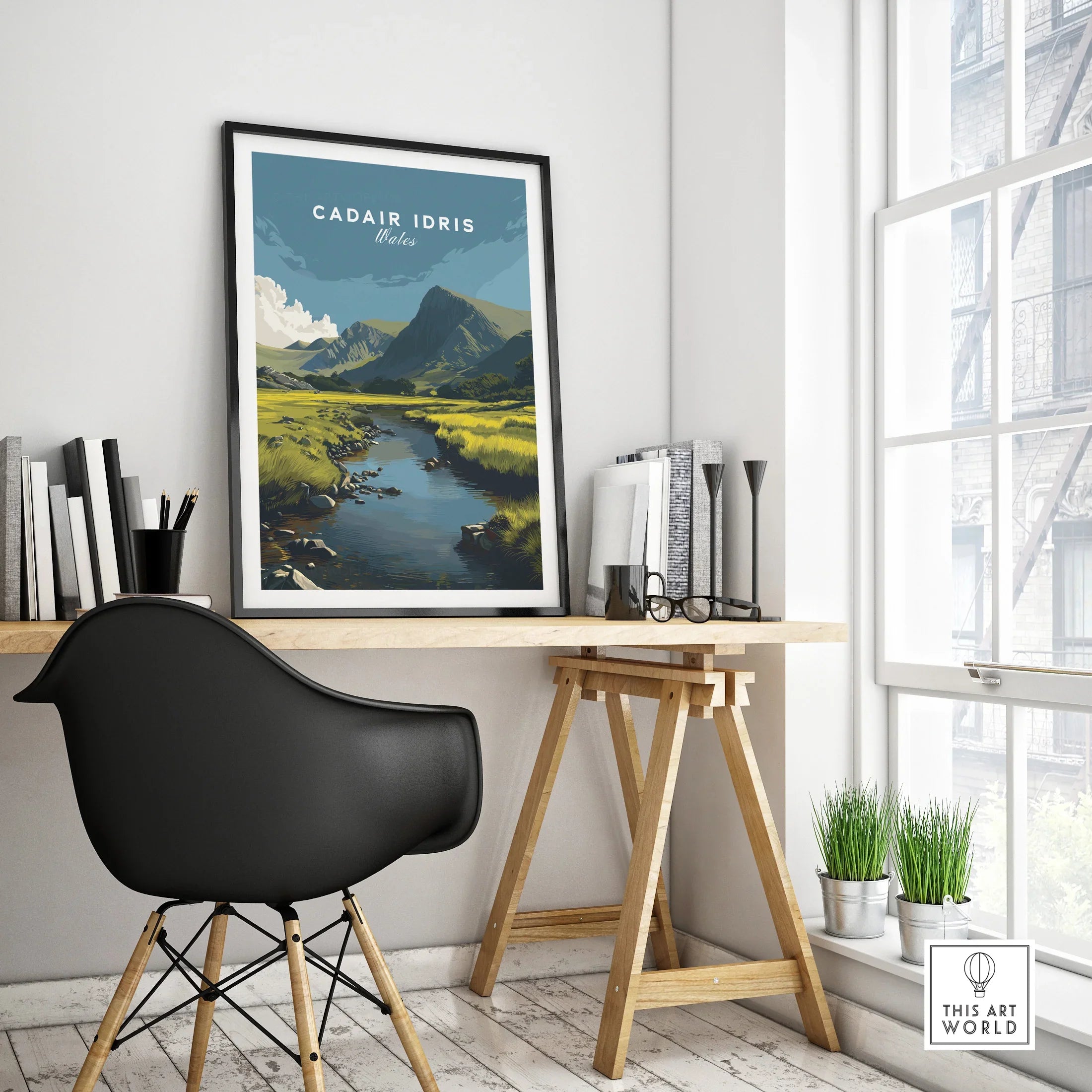 Framed Cadair Idris travel poster on modern office desk with chair and decor