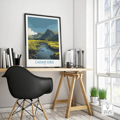 Framed Cadair Idris travel poster on modern office desk by window, minimalist decor