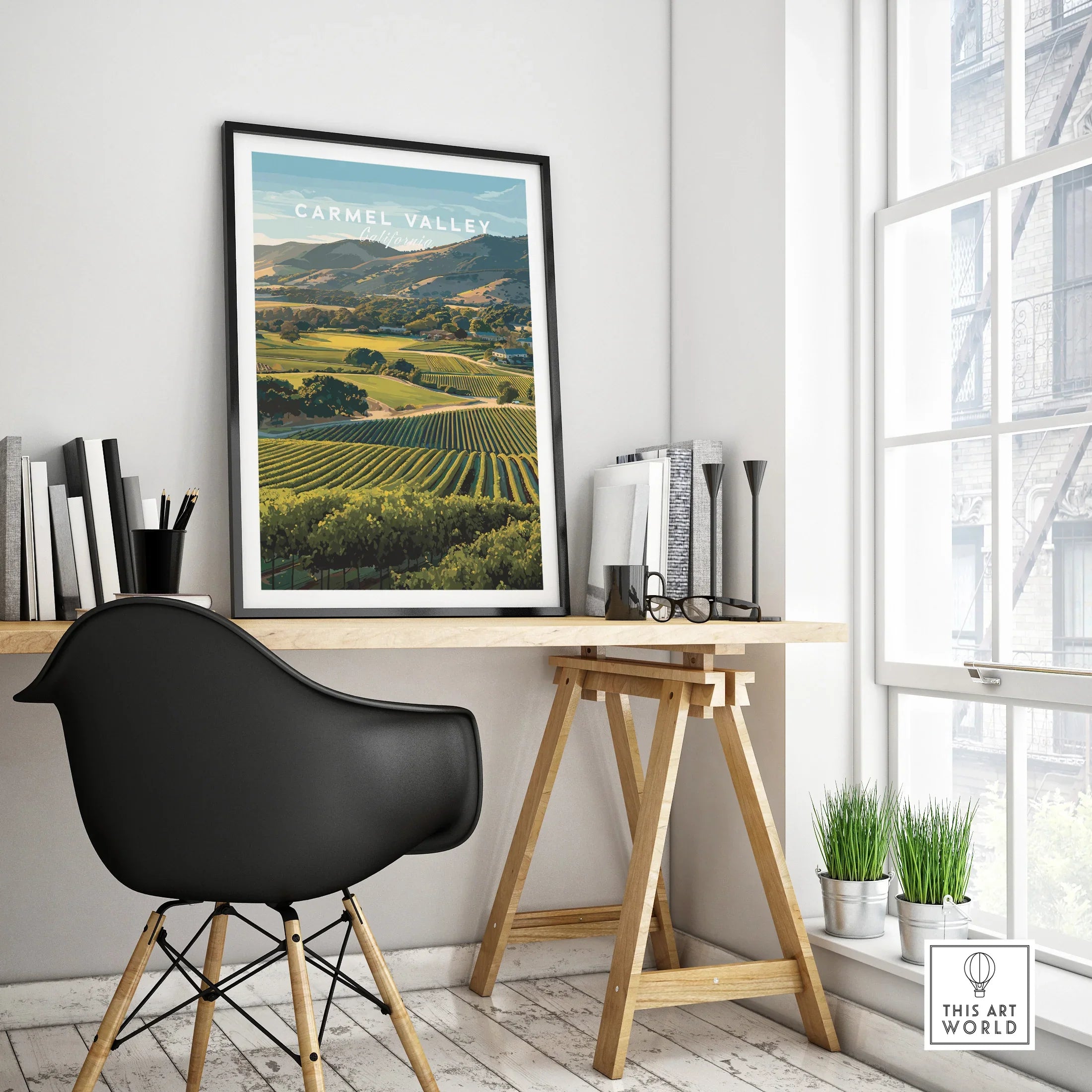 Carmel Valley travel poster in black frame on modern office desk, minimal home decor