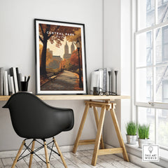 Framed Central Park New York poster on modern office desk, black chair, autumn scene wall art