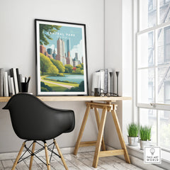 Framed Central Park New York travel poster on modern office desk with city skyline art