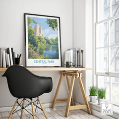 Framed Central Park travel poster on modern office desk with black chair and bright window.