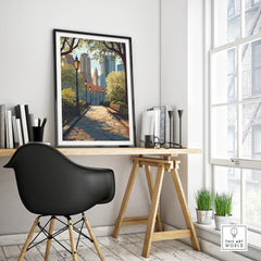 Framed Central Park travel poster on a modern office desk with city skyline wall art.