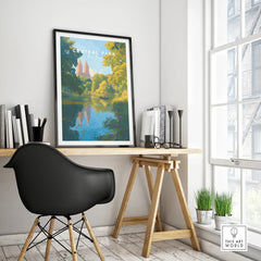 Central Park framed travel poster on modern office desk with city view