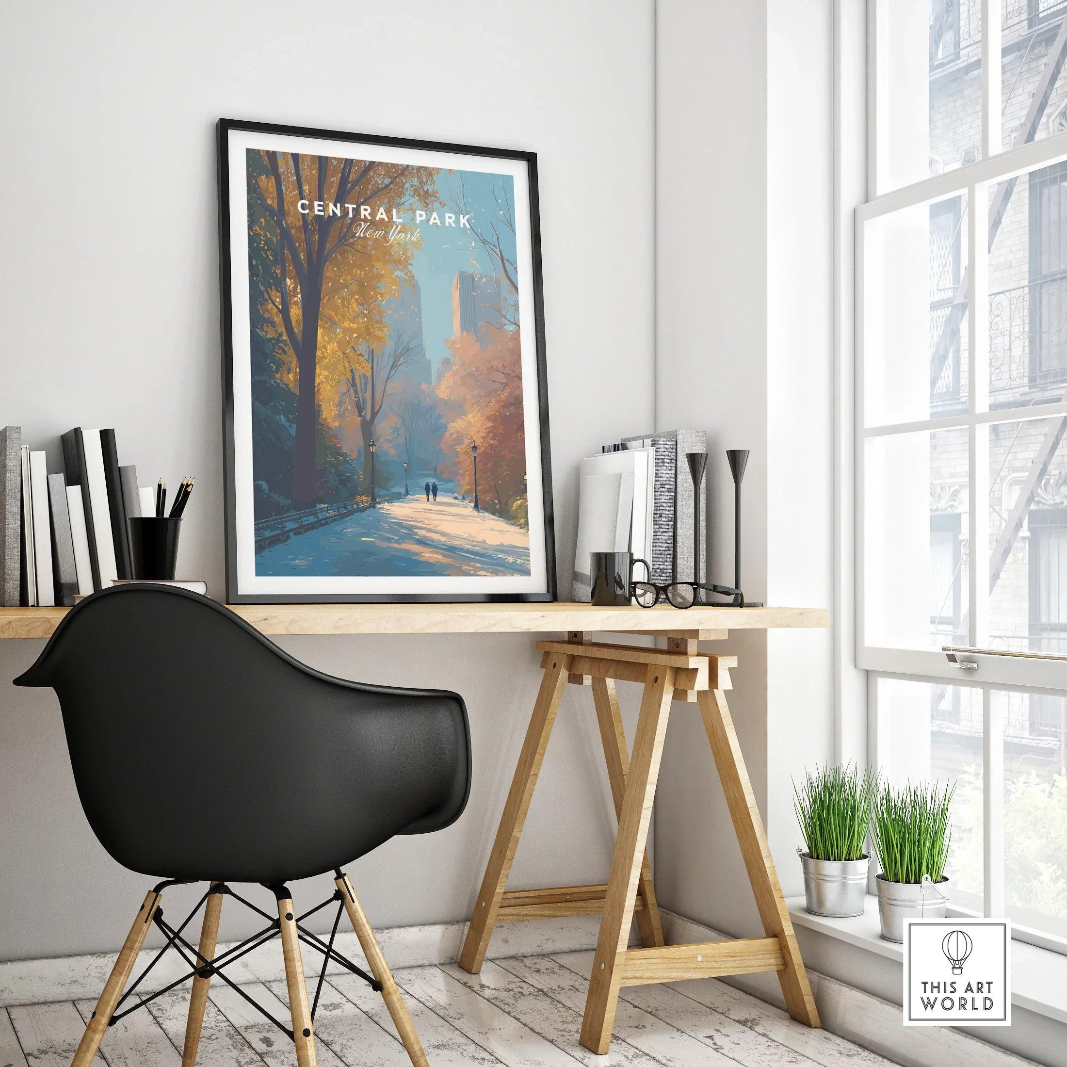Framed Central Park New York travel poster on a modern office desk with autumn colors