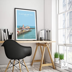 Clacton-on-Sea Travel Poster – Historic Pier Art Print displayed in a modern interior with a stylish chair and desk.