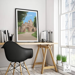 Colchester travel poster in black frame on modern office desk near window, home decor art print