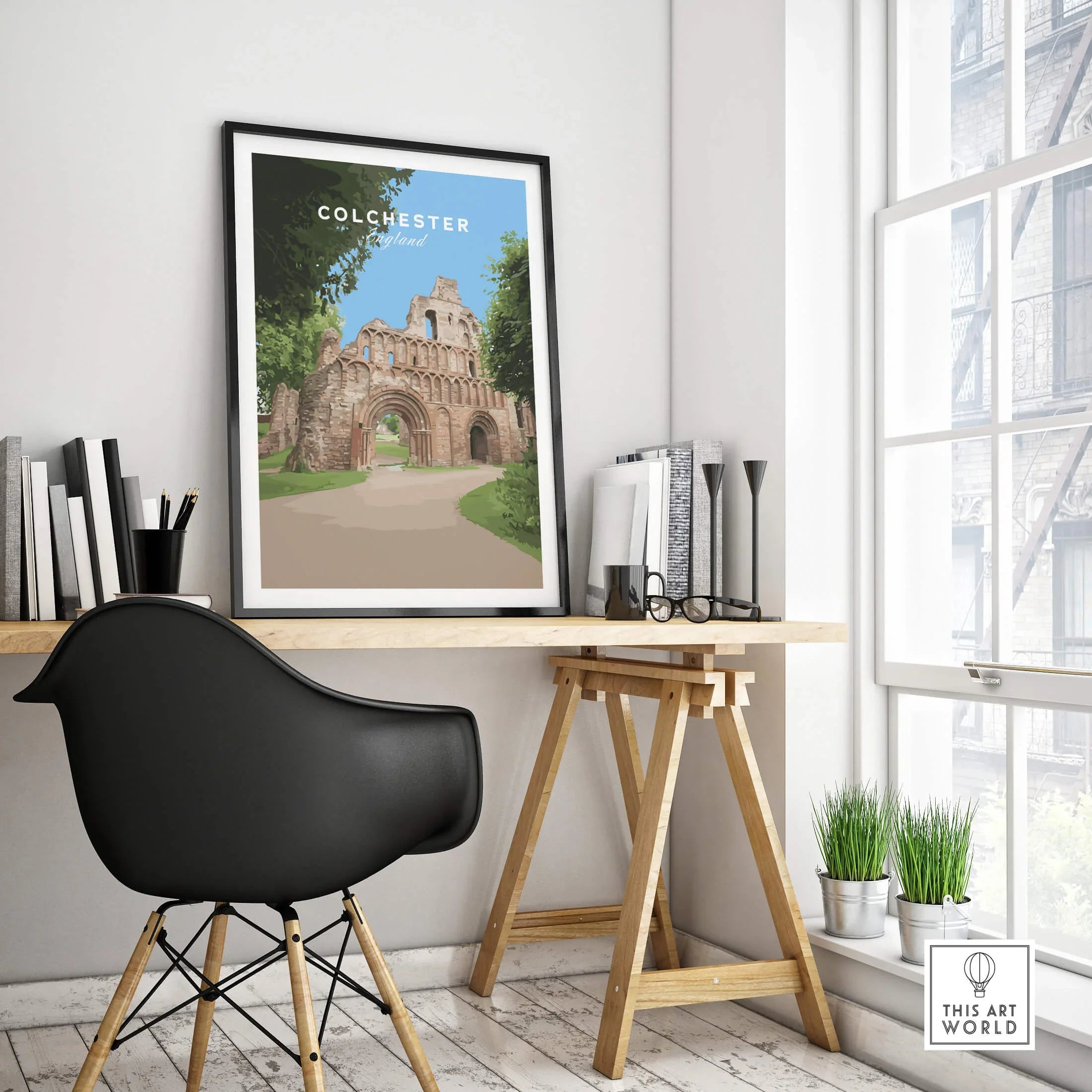 Colchester travel poster in black frame on modern office desk near window, home decor art print