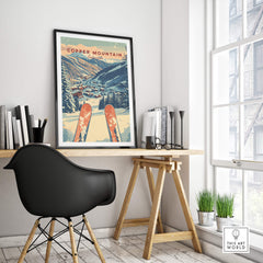 Copper Mountain Travel Poster – Sunset Ski Slopes framed on a desk with modern decor and ski equipment view.
