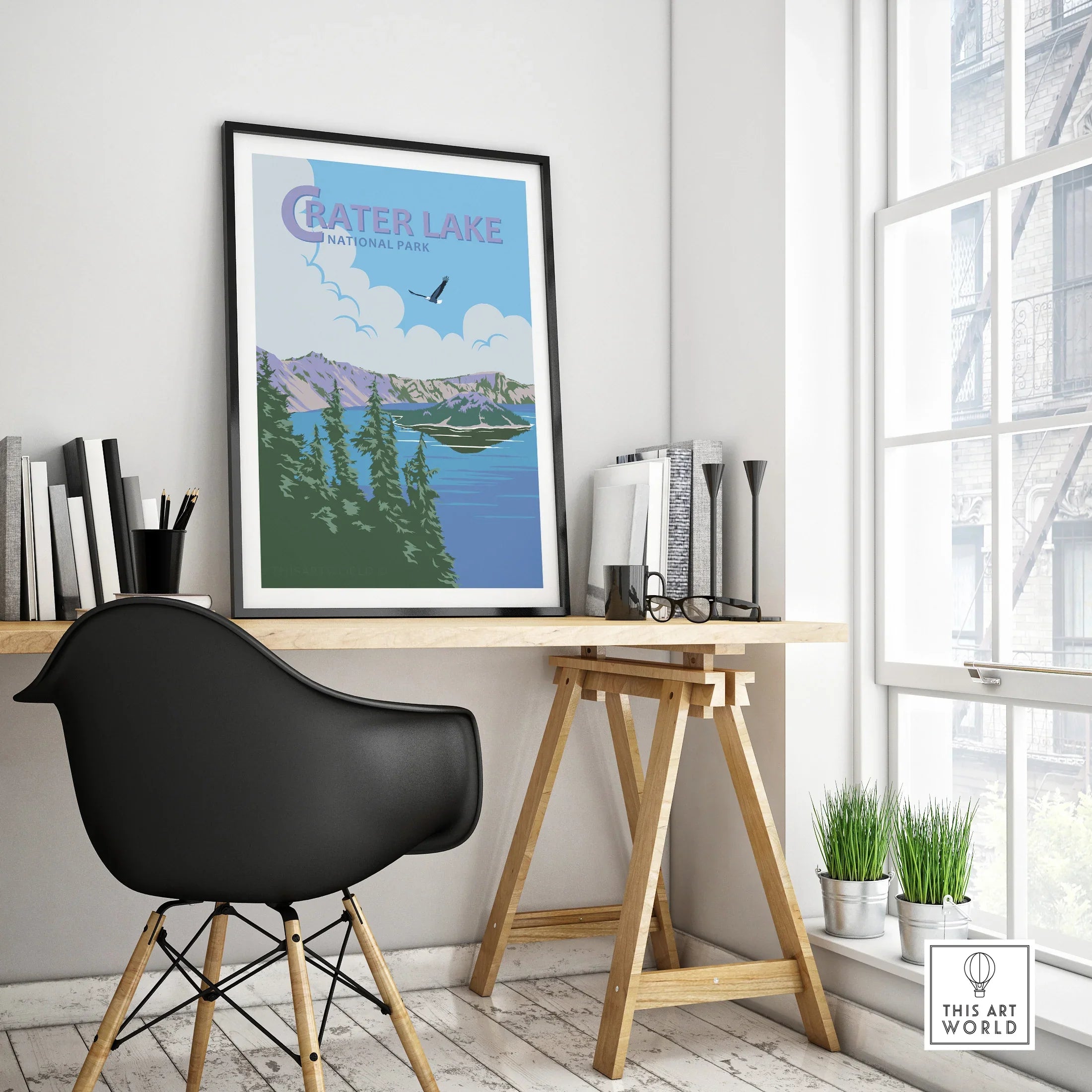 Framed Crater Lake National Park travel poster on modern office desk with black chair