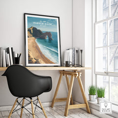 Durdle Door Poster – Jurassic Coast Wall Art framed on a wall in a modern workspace with coastal decor.