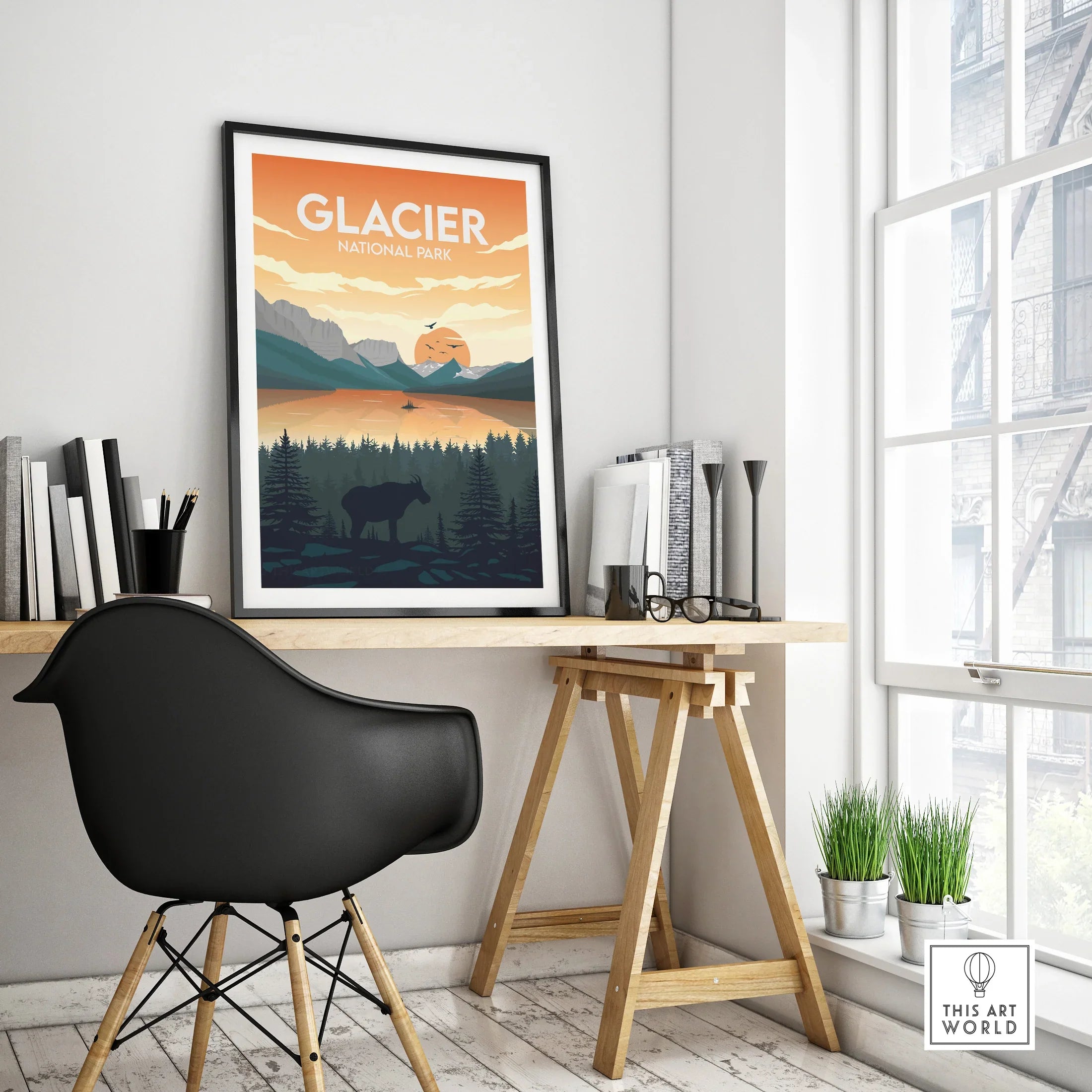 Framed Glacier National Park travel poster on modern office desk with black chair