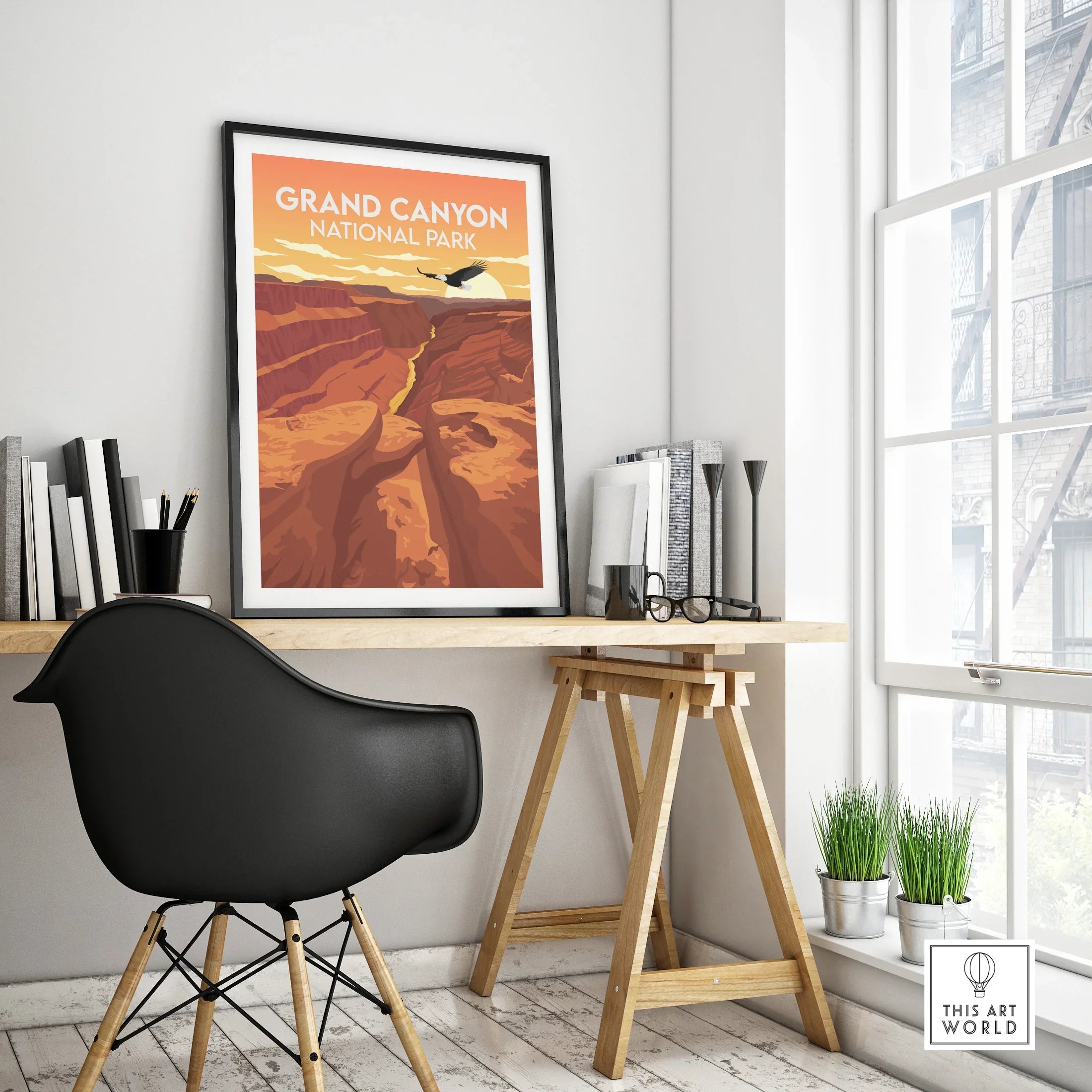 Grand Canyon National Park travel poster in black frame on modern office desk