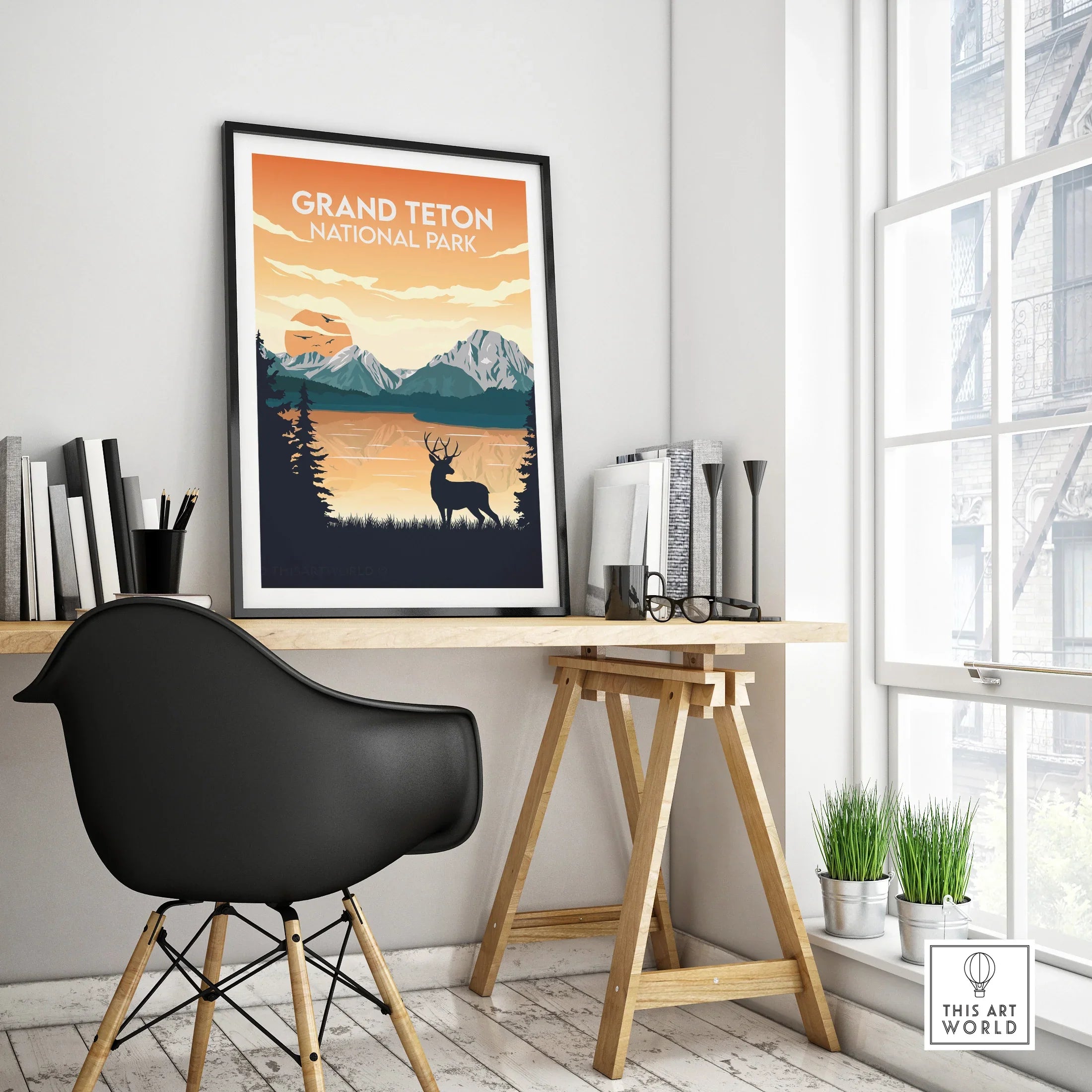 Framed Grand Teton National Park travel poster on modern office desk décor, mountain wall art