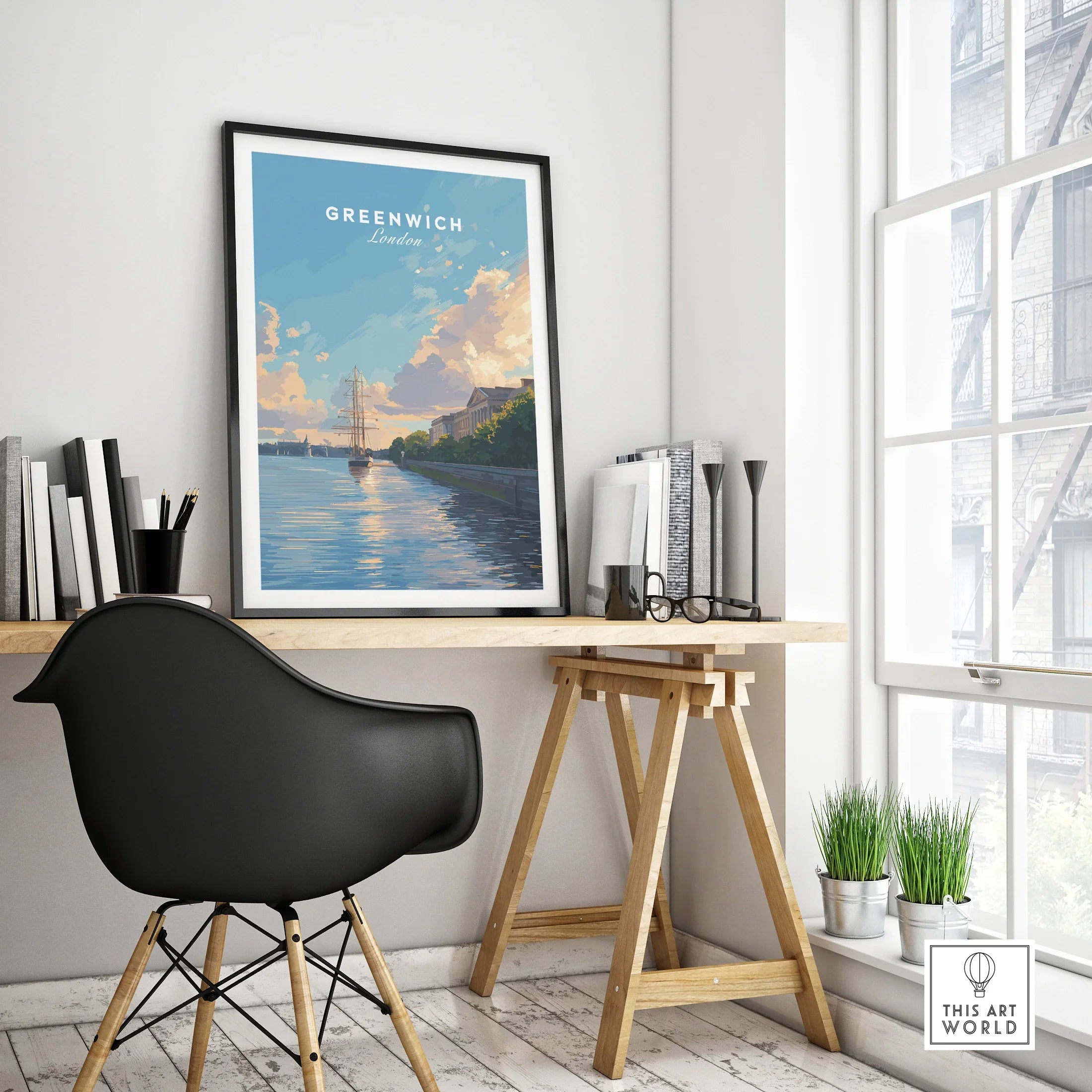 Framed Greenwich London travel poster on modern office desk with chair and decor