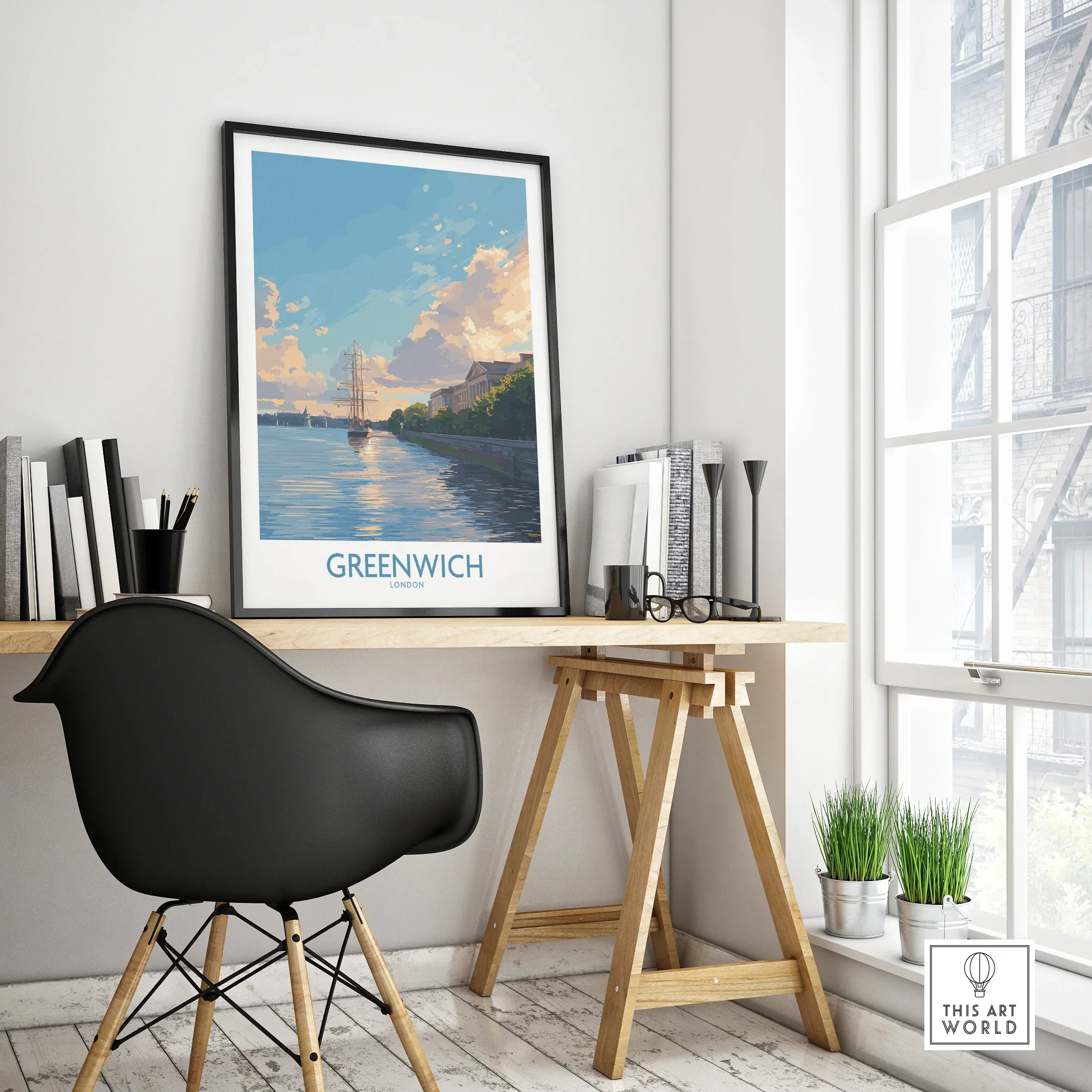 Framed Greenwich travel poster on modern office desk with black chair and decor